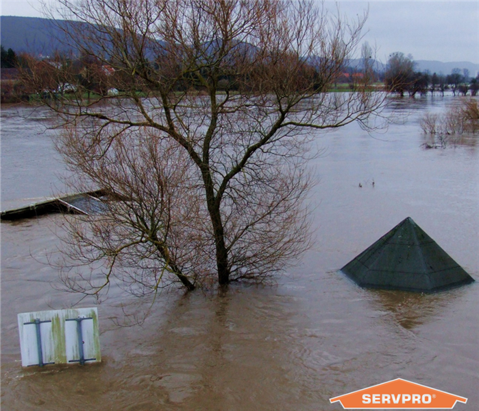 flood scene with SERVPRO logo