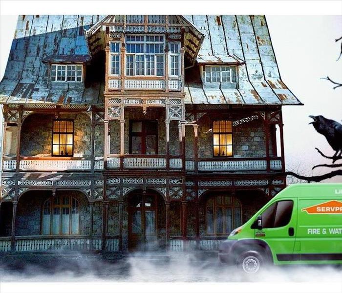 SERVPRO van and haunted house